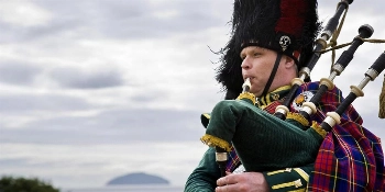 British Isles Small Group Golf Tour Vacation Package The Turnberry Piper - PerryGolf 